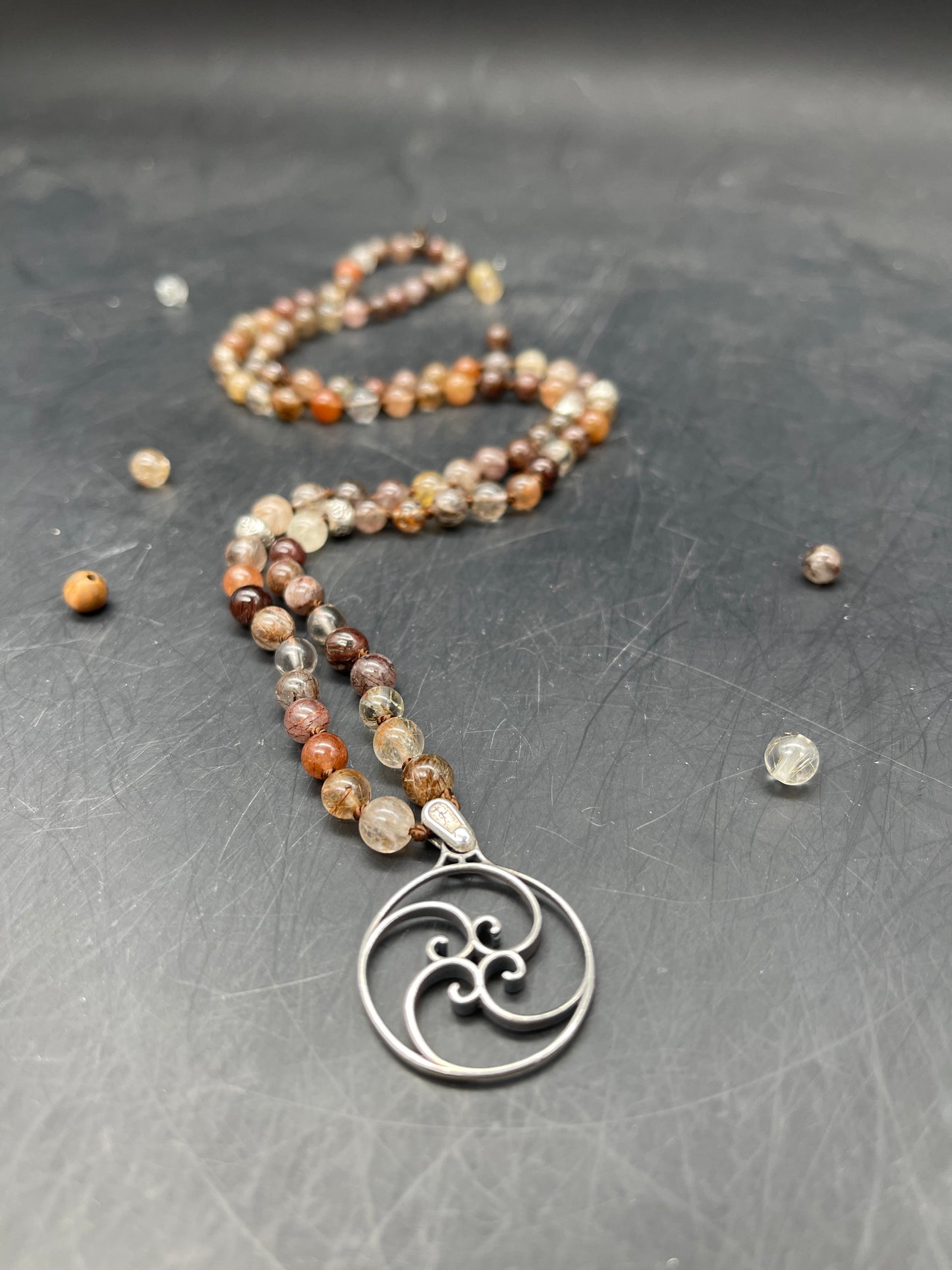 Red, Brown, Yellow Rutile Quartz, & Sterling Silver Ohm + Fibonacci Spiral